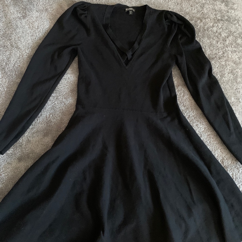 Black dress with crisscross front.